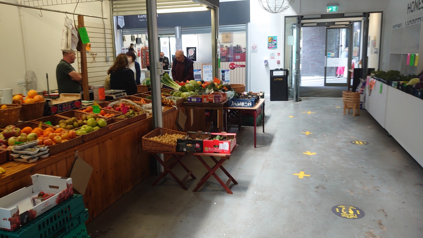 grocers shop with fresh fruit and veg on display