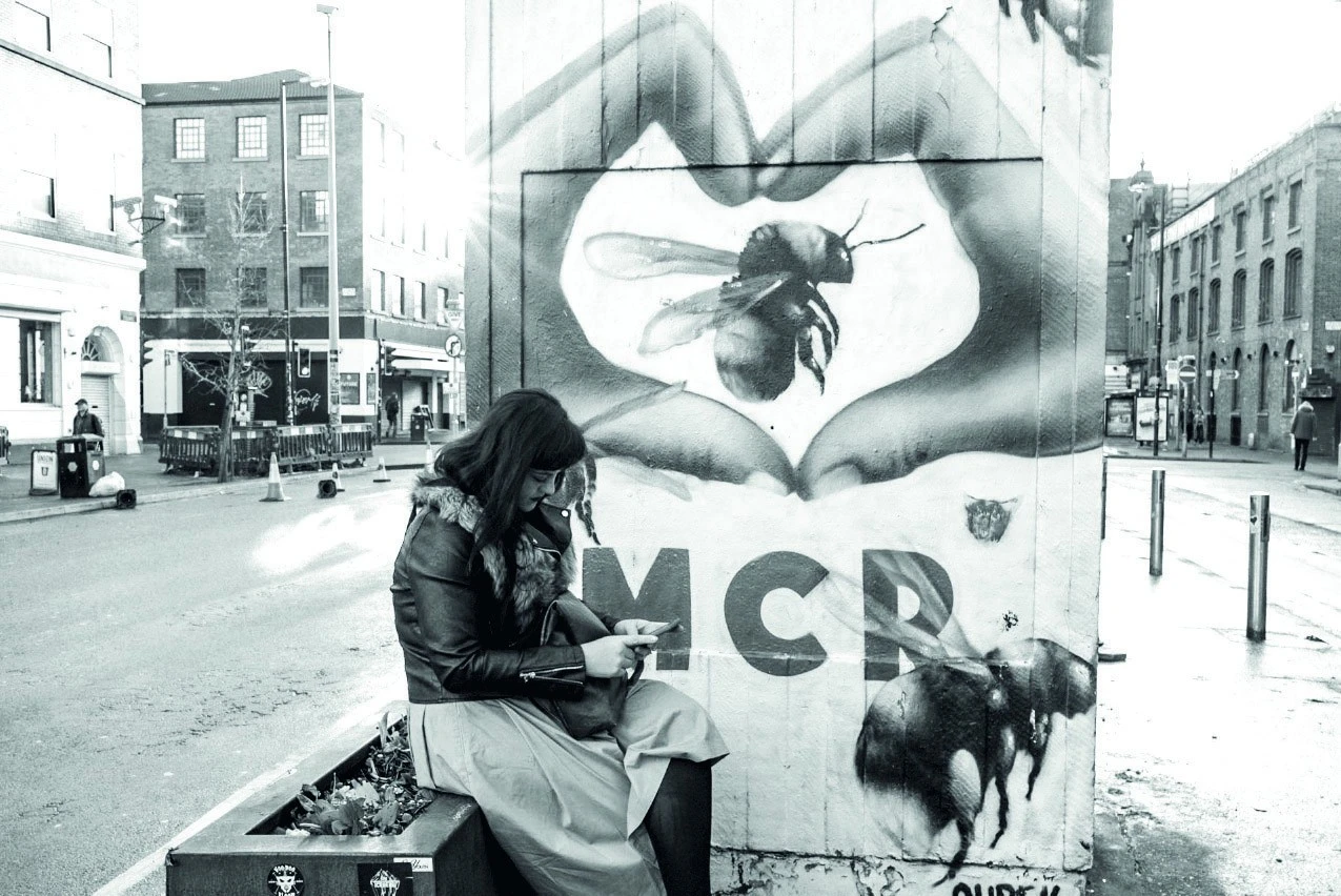 Mural of the Manchester Bee in Stephenson Square