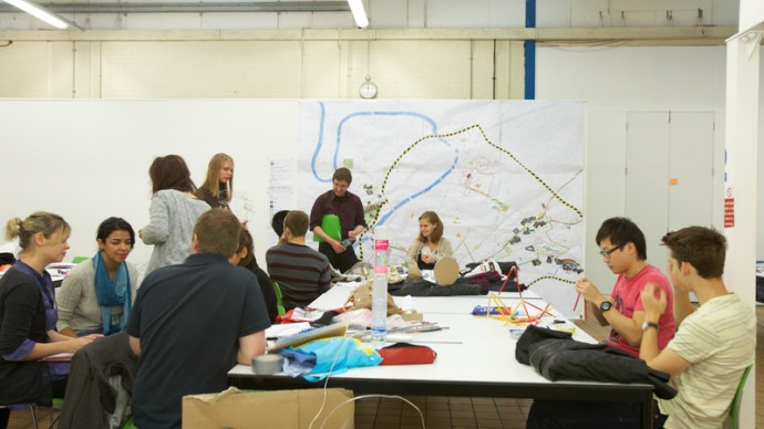 A group of students in an art classroom
