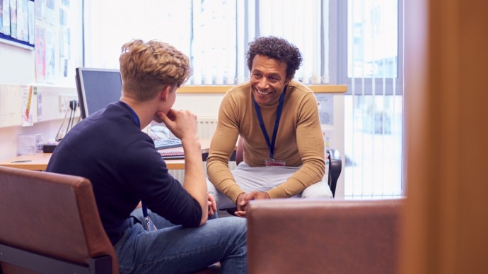 Male student in a meeting with a career counsellor