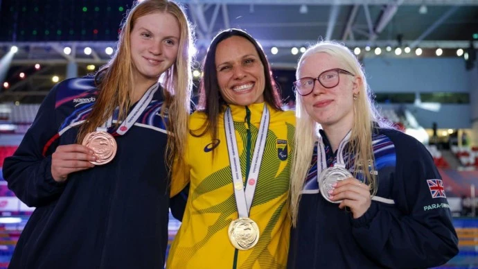 Ela Letton-Jones with her peers proudly showing her silver medal