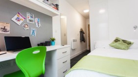 Ropemaker Court Ensuite Bedroom with large comfy bed, desk, drawers, mirror and storage space