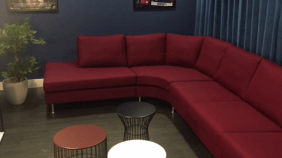 Ropemaker Court Cinema Room with long sofa and coffee tables