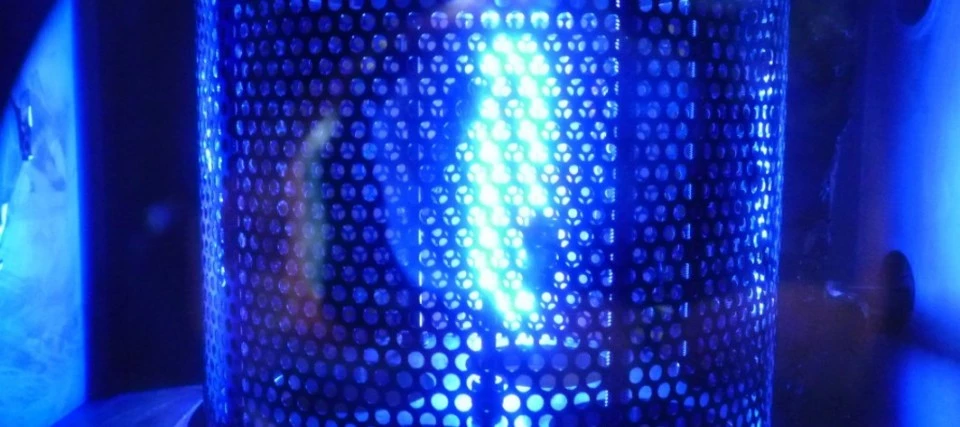 Plasma inside a drum within a coating system for thin films