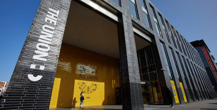 Outside of the Students' Union building in the sunshine